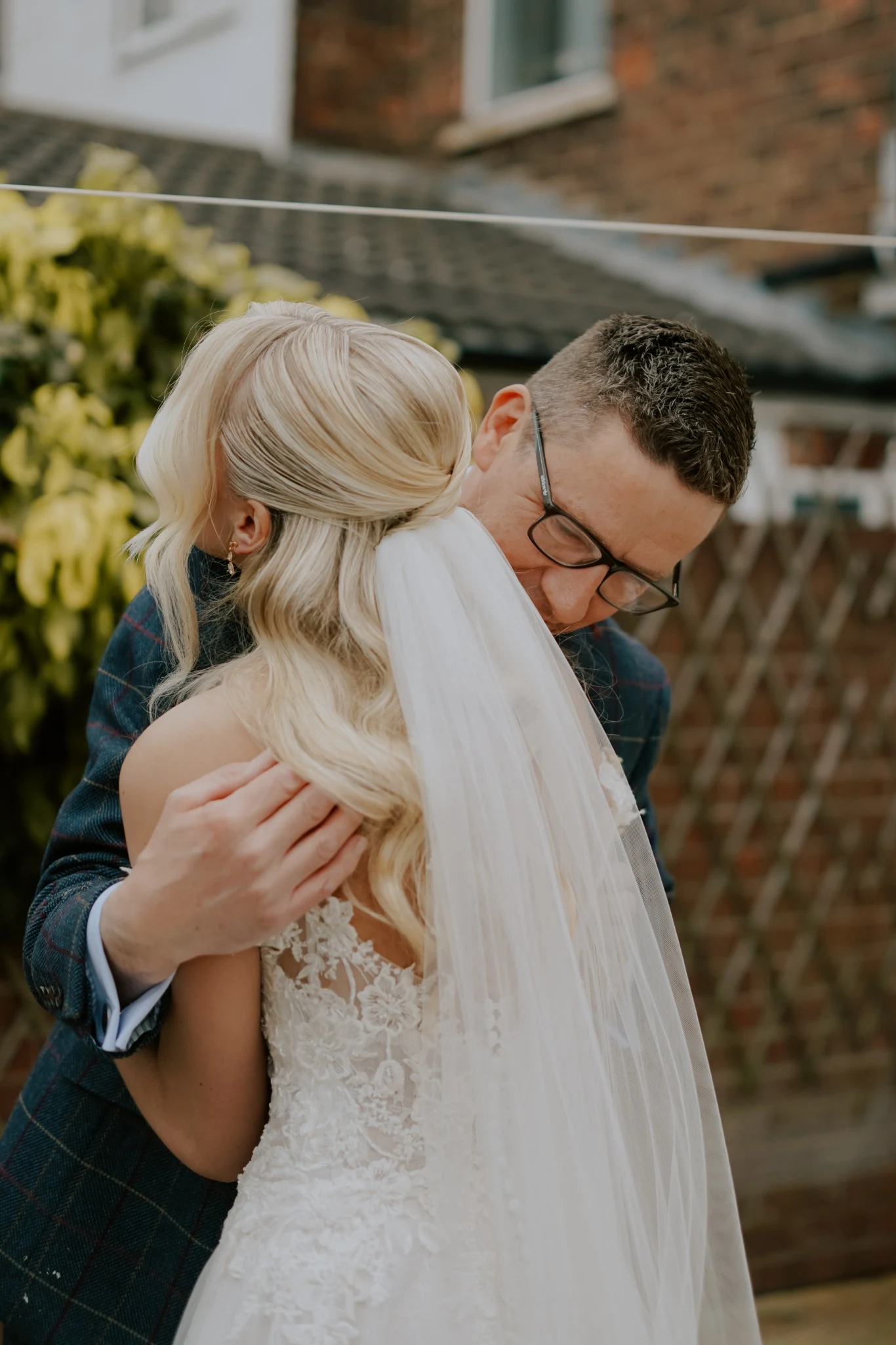 Mr & Mrs Payne bridal hair — the bride and groom together, her hair dressed with a veil.